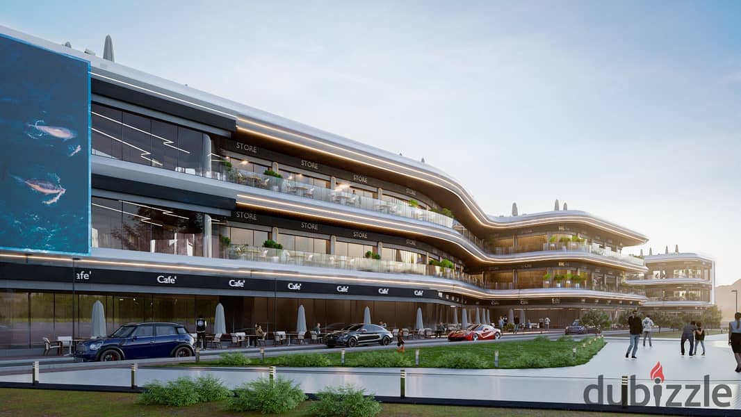 A commercial store with a service roof space directly on the sea in the first mall that holds a gas station license on Ain Sokhna Road with a 10% down 13