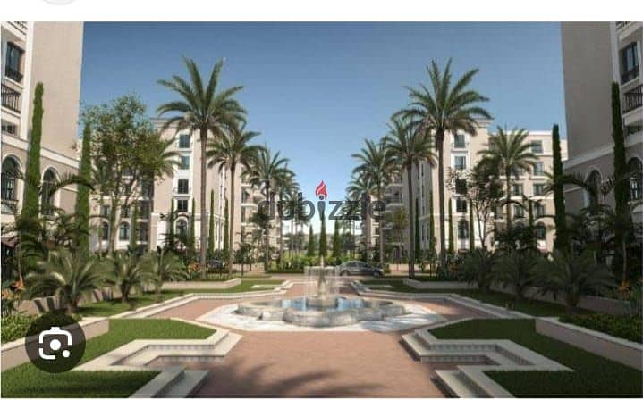 View and receive immediately a fully finished apartment with air conditioners, double view, in Sheikh Zayed, in Village West Dora, in installments 4