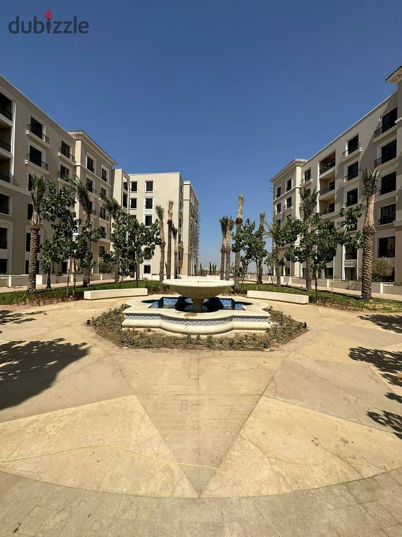 View and receive immediately a fully finished apartment with air conditioners, double view, in Sheikh Zayed, in Village West Dora, in installments 5