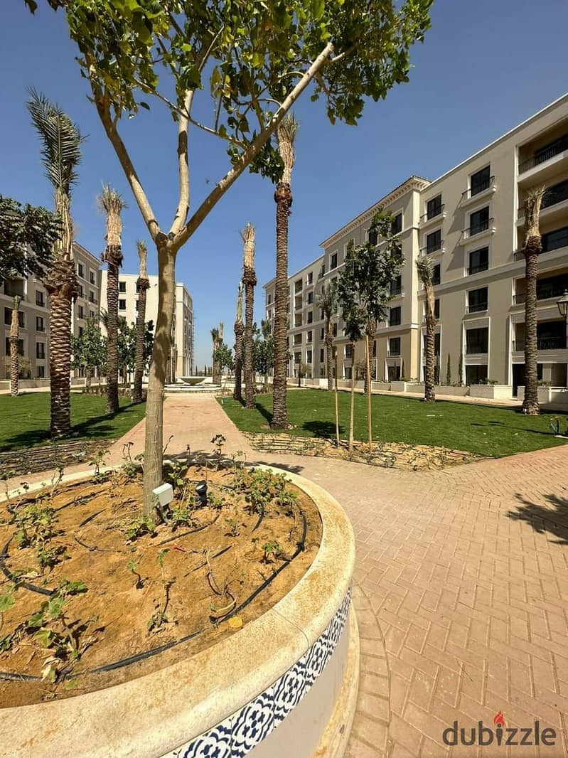 View and receive immediately a fully finished apartment with air conditioners, double view, in Sheikh Zayed, in Village West Dora, in installments 10