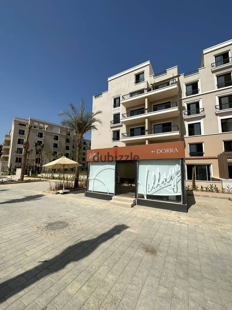 View and receive immediately a fully finished apartment with air conditioners, double view, in Sheikh Zayed, in Village West Dora, in installments 16