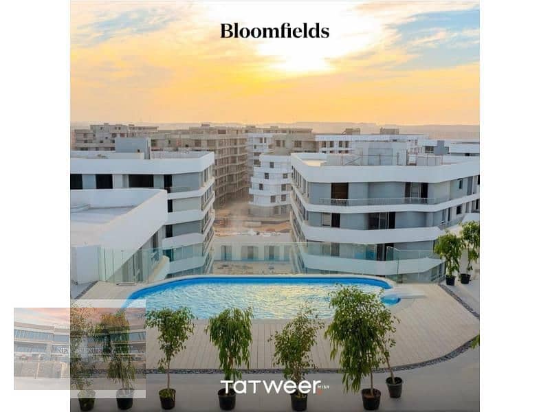 Corner Lake View APT for sale in Bloomfields Mostakbal city Overlooking lake and greenery - Core and shell 2