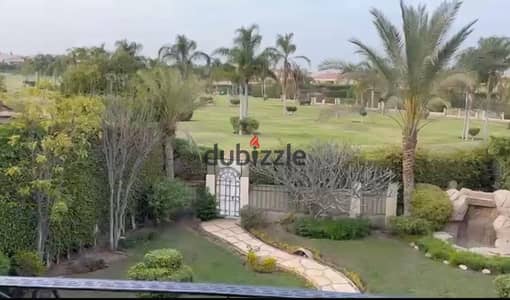 standalone villa for sale in Al Rabwa Compound, with a view of the golf  the largest model . Sheikh Zayed, a terrace higher than the golf