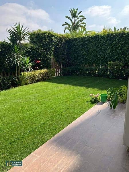 A townhouse villa with a private garden for sale at the price of an apartment in the heart of 6th of October City, Mountain View Compound 'King's Way. 3