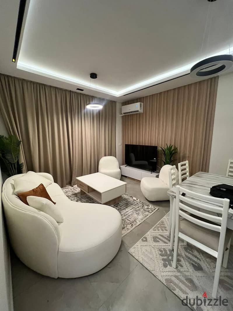 Luxuriously furnished hotel apartment in Madinaty, consisting of two rooms and a bathroom, fully air-conditioned 1