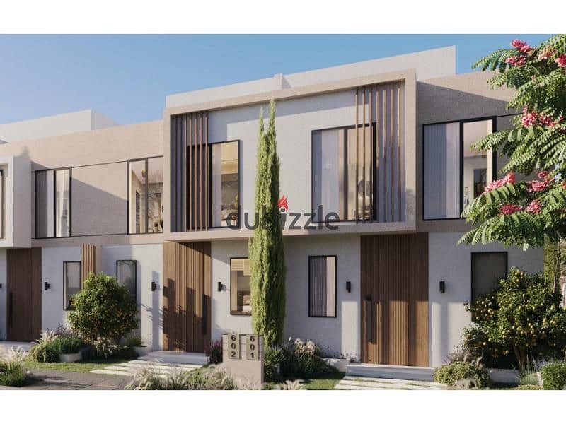 Townhouse for sale in October next to Palm Hills, installments over 10 years, Villagio Compound 5