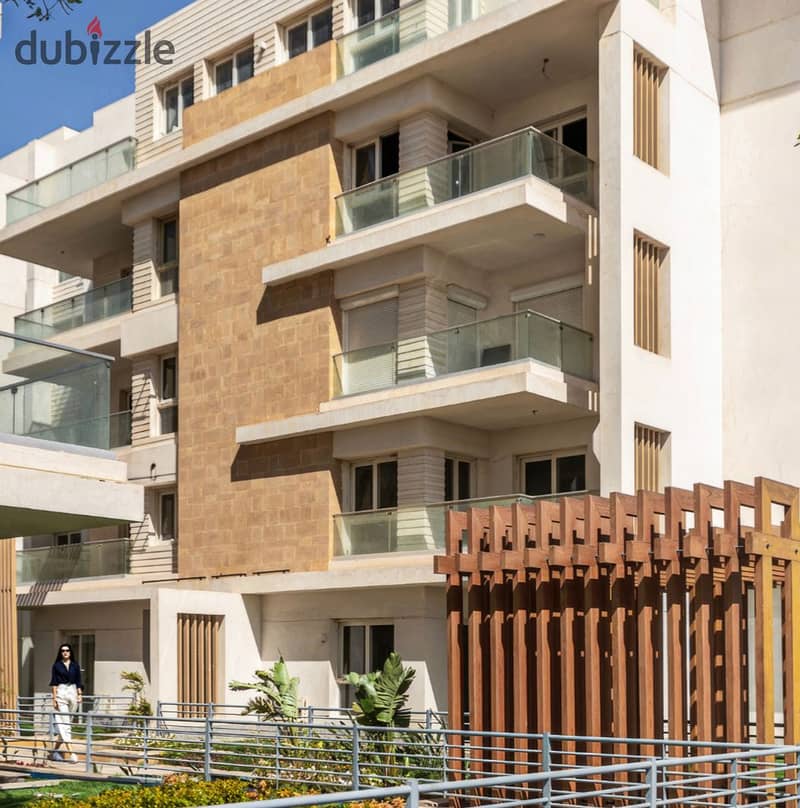 Live immediately in Mountain View, an apartment with a landscape view, in installments at the best price in Sheikh Zayed 4