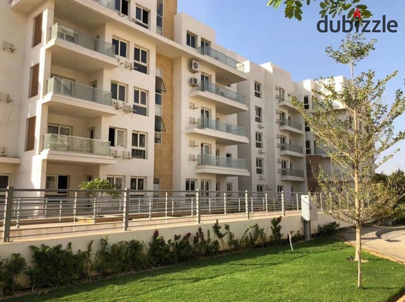 Live immediately in Mountain View, an apartment with a landscape view, in installments at the best price in Sheikh Zayed 8