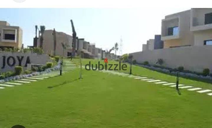 Ground floor apartment with garden, immediate delivery, in the eastern expansions, in front of Palm Parks, in installments 2