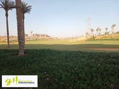 Prime location view golf apartment For sale 152 M In Uptown Cairo