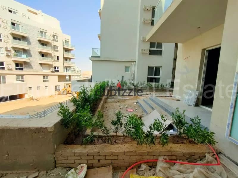 شقة بجاردن  لقطة للبيع باقل سعر في الماركت متشطبة  ماونتن فيو -  New Cairo / Mountain View iCity Compound 1