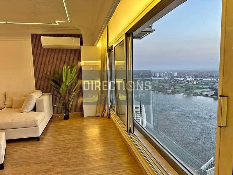 Apartment for sale, immediate receipt With an open view of the Nile on Maadi Corniche in Reef Du Nile Towers 2