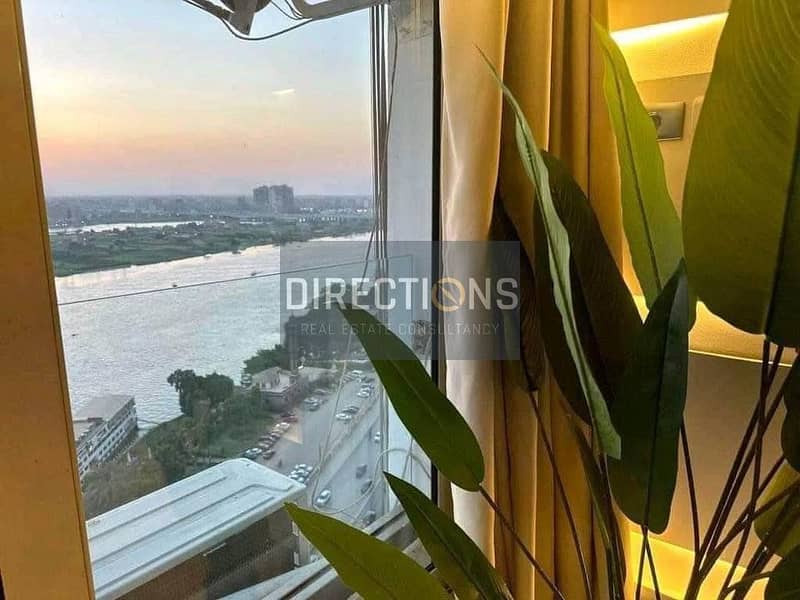 Apartment for sale, immediate receipt With an open view of the Nile on Maadi Corniche in Reef Du Nile Towers 3