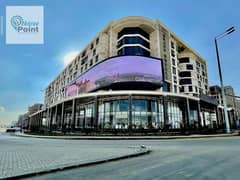 Close to the ministries, own a commercial store with immediate delivery and rent from the first day in Grand Square, the Administrative Capital 0