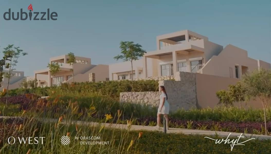 View and live immediately in O West Samih Sawiris, a fully finished apartment with installments over 7 years, Prime Location Direct, on Al Wahat Road 11