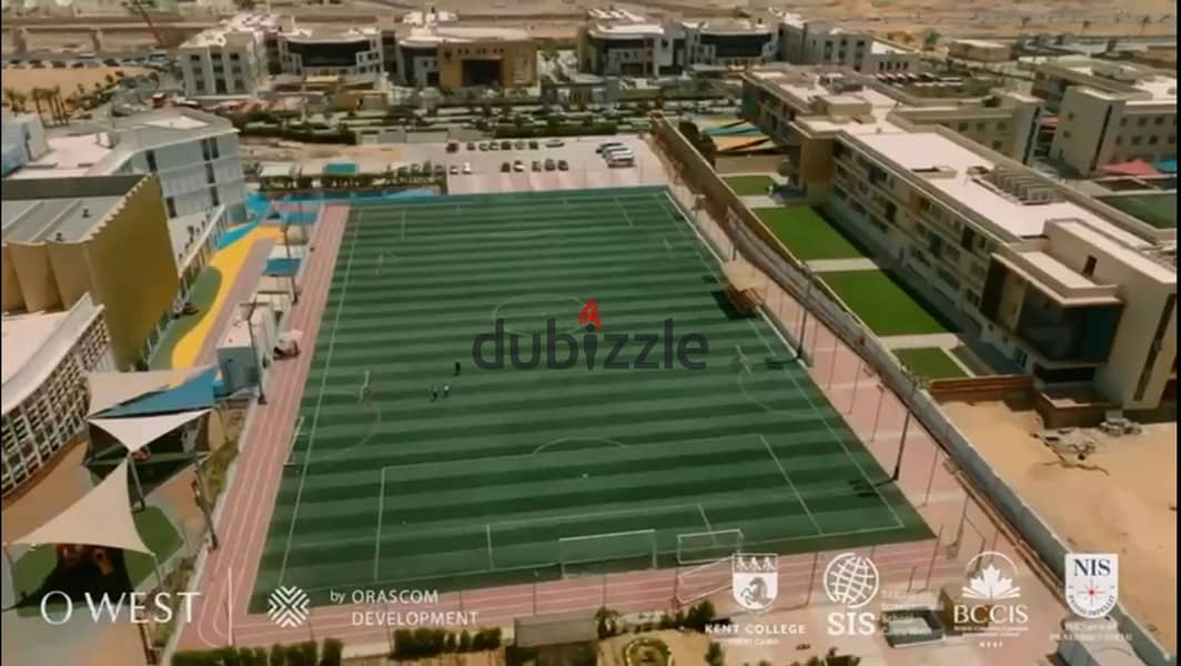 View and live immediately in O West Samih Sawiris, a fully finished apartment with installments over 7 years, Prime Location Direct, on Al Wahat Road 14