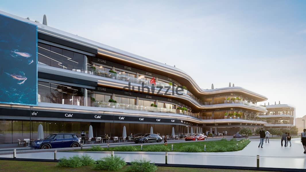 A commercial store with a service roof space directly on the sea in the first mall that holds a gas station license on Ain Sokhna Road with a 10% down 2