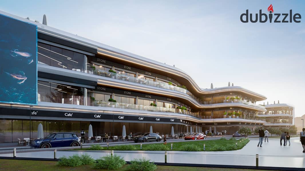 A commercial store with a service roof space directly on the sea in the first mall that holds a gas station license on Ain Sokhna Road with a 10% down 13