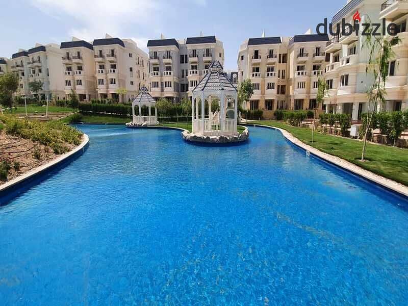 Corner townhouse in Mountain View, located in a prime area in October, just steps away from Mall of Arabia and Hyper One. 1