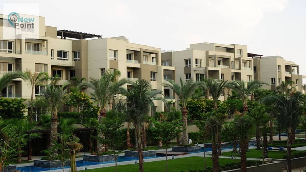 Ground floor apartment with garden for sale in prime location in Swan Lake Compound, Hassan Allam, directly in front of Rehab 13