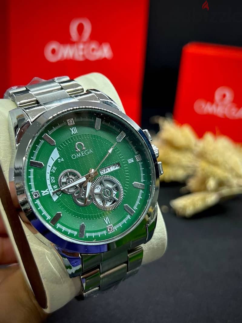 Omega ساعه هاي كوبي بـ اوستيك معدن و ظرف صلب لون ثابت 1