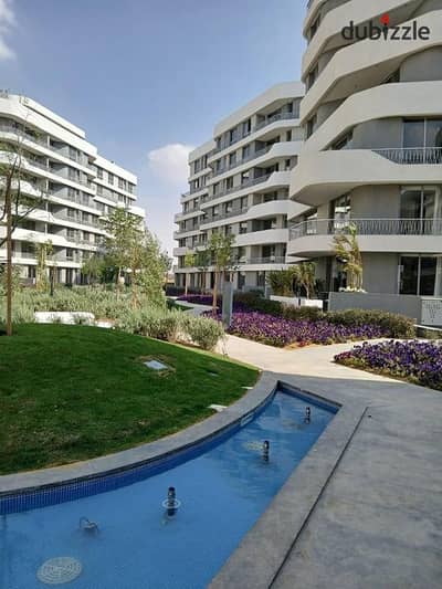 Apartment for sale with a private garden in installments in a very special location on the landscape in Mistakabl City, Bloomfield' Compound, Emdad, F