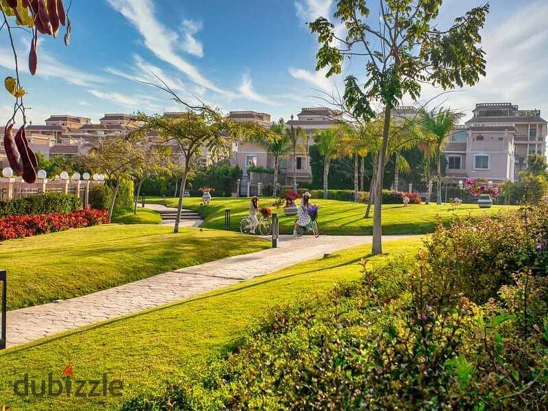 A 730 sqm villa is available for sale with an installment plan in Cleopatra Square compound, located in the prime area of Eastern expansions in Octobe 4