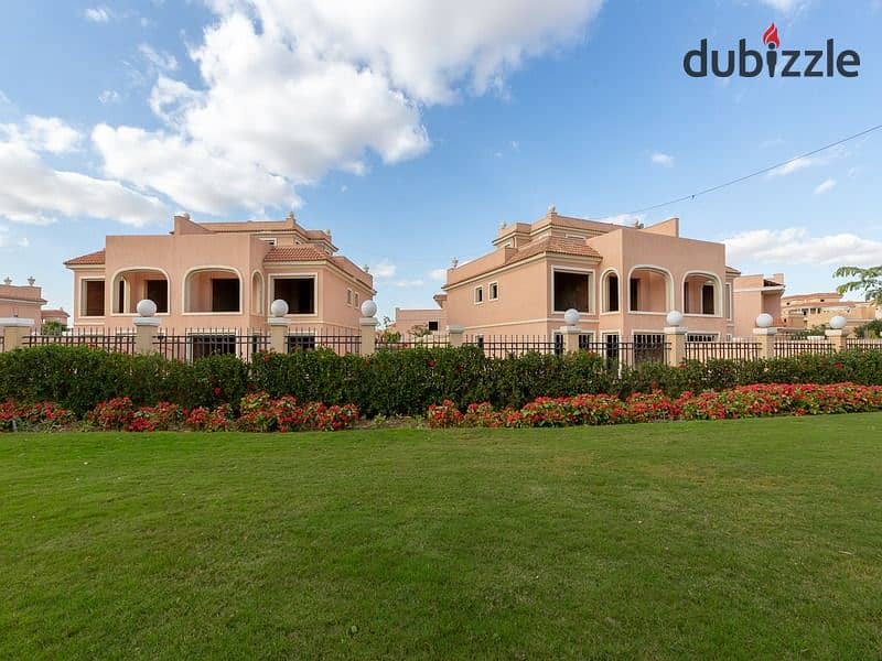 A 730 sqm villa is available for sale with an installment plan in Cleopatra Square compound, located in the prime area of Eastern expansions in Octobe 6