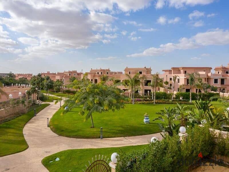 A 730 sqm villa is available for sale with an installment plan in Cleopatra Square compound, located in the prime area of Eastern expansions in Octobe 15