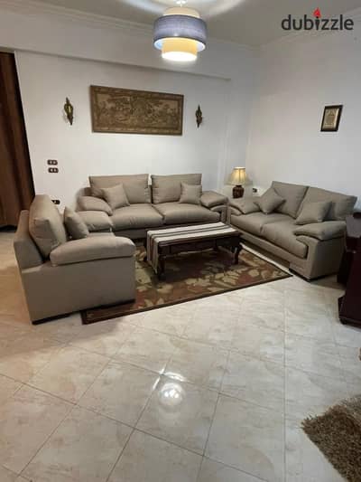 A fully furnished apartment for rent in Al Narges Buildings in the Fifth Settlemen