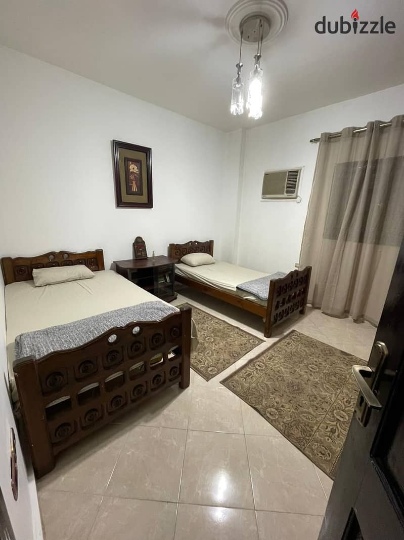 A fully furnished apartment for rent in Al Narges Buildings in the Fifth Settlemen 7