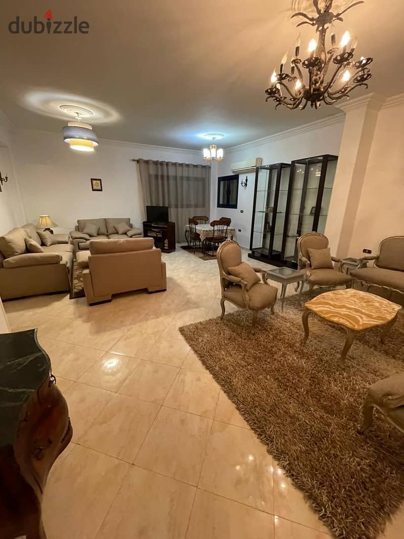 A fully furnished apartment for rent in Al Narges Buildings in the Fifth Settlemen 10