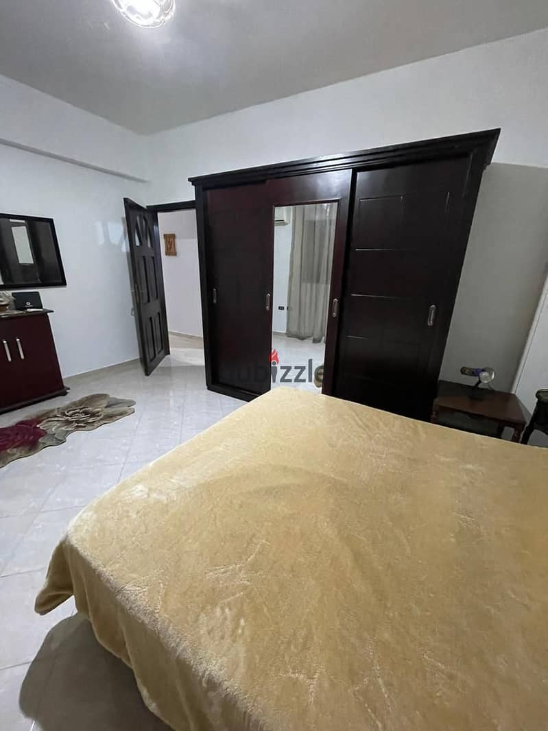 A fully furnished apartment for rent in Al Narges Buildings in the Fifth Settlemen 13