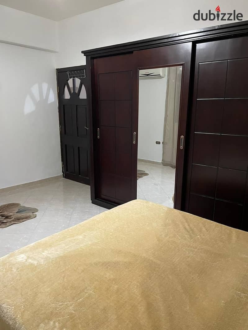 A fully furnished apartment for rent in Al Narges Buildings in the Fifth Settlemen 18