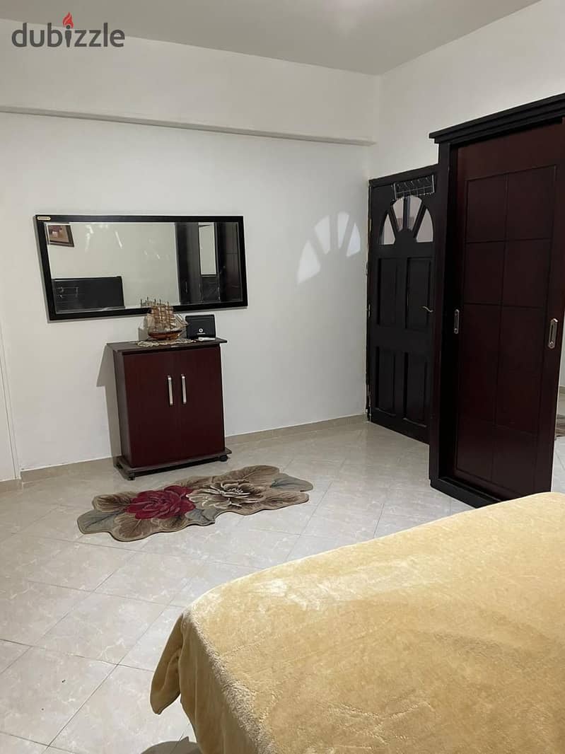 A fully furnished apartment for rent in Al Narges Buildings in the Fifth Settlemen 19