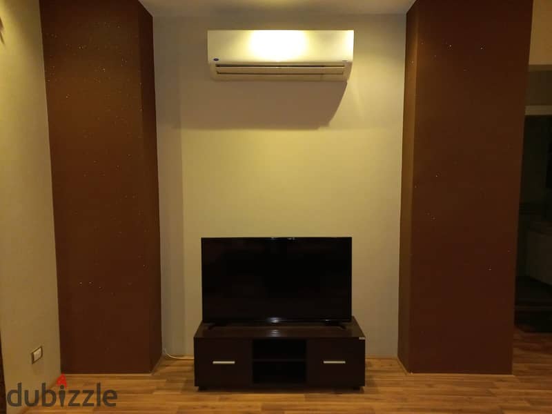 Studio 88m semi furnished for sale in village gate New Cairo. 2