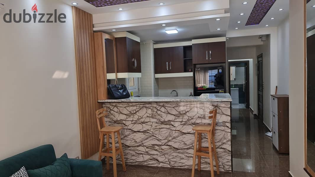 Furnished studio with garden for sale Regents Park new cairo 5