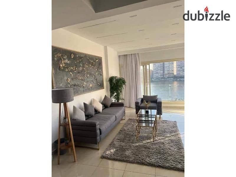 Hotel apartment on the Nile Corniche, fully finished with air conditioners, appliances and kitchen in Nile Pearl Towers Maadi 1