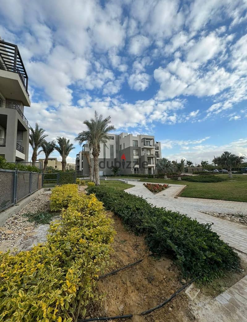 Live in PALM HILLS in a fully finished apartment in installments, prime location in Sheikh Zayed 2