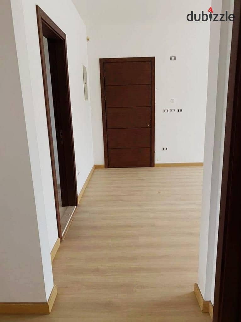 A finished apartment in one of the most distinguished locations, behind Mall of Arabia and close to Grand Heights Compound, in Kayan Compound. 11