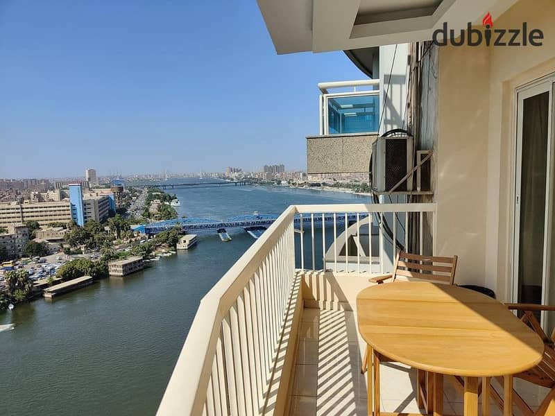 Luxury Hotel Apartment with Stunning Nile and Pyramids View Next to Hilton hotel  Pearl Tower 6