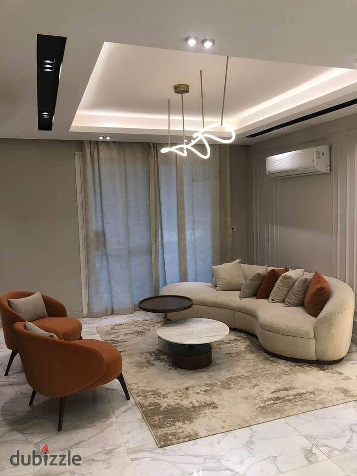 Apartment for sale, fully finished, in New Cairo, a prime location in front of the entrance to Rehab 1 {Swan Lake Residence Compound} by Hassan Allam 1