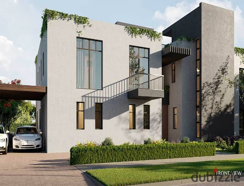 The user lives in O West in a 400-square-meter villa, purchased through a long-term installment plan, in a prime location directly on Al Wahat Road. 13