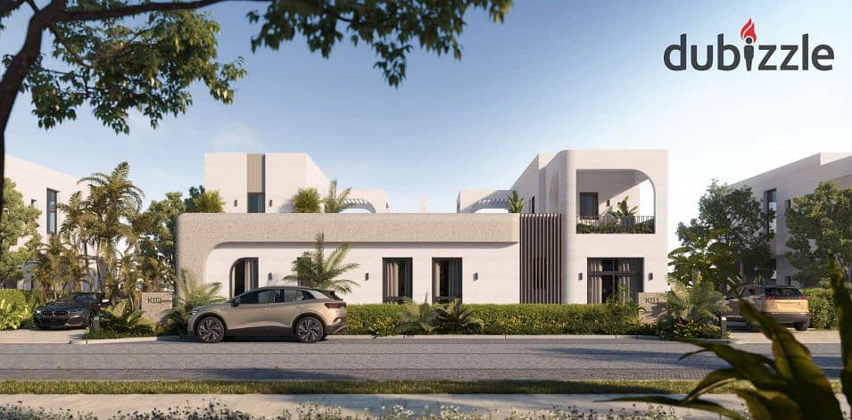 The user lives in O West in a 400-square-meter villa, purchased through a long-term installment plan, in a prime location directly on Al Wahat Road. 15