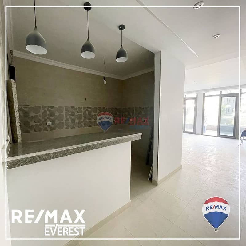 Resale 2 bedrooms fully finished ground floor apartment at Sun Capital compound - Hadayek October. 3