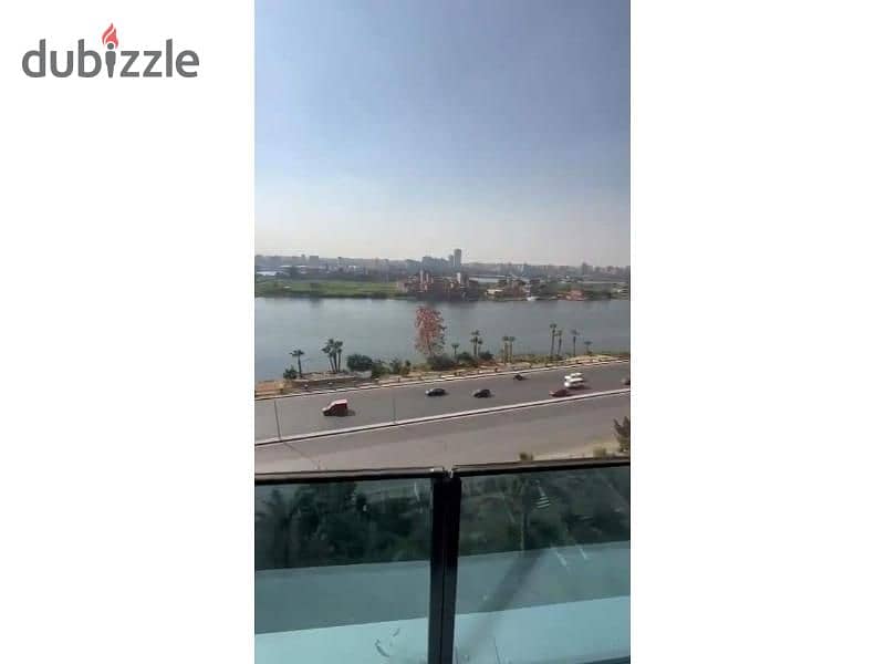 Hotel apartment for sale, immediate receipt, finished, with kitchen and air conditioners, next to the Hilton Hotel in Nile Pearl Towers, Maadi 8