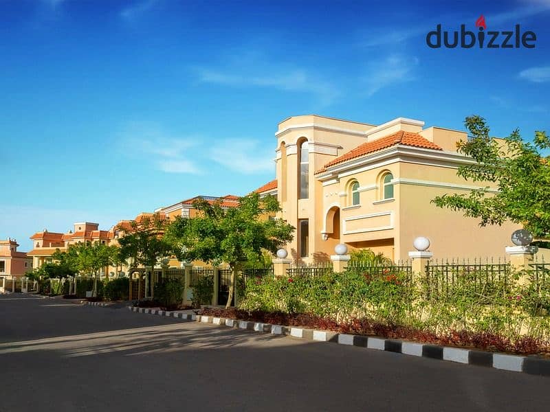 A 335-square-meter twin house is available for immediate delivery in Cleopatra Square compound, Sheikh Zayed, with an installment plan. 1