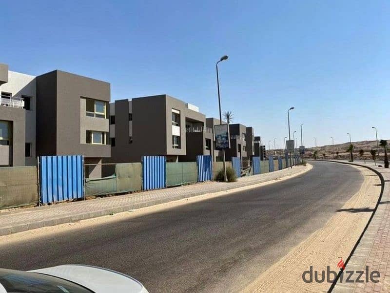 A 395-square-meter twin house is available for immediate delivery in ETAPA compound, Sheikh Zayed, with an installment plan over 10 years 29