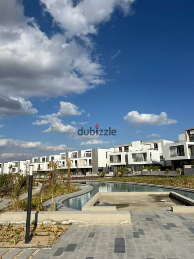 Corner townhouse, 430 sqm, in JOULS compound, across from Mountain View Giza Plateau, with installment plans over 6 years.