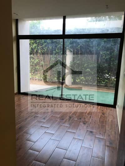 Ground floor apartment with a garden 122M fully finished with air conditioners remaining installments with the company a bargain for a quick sale in L